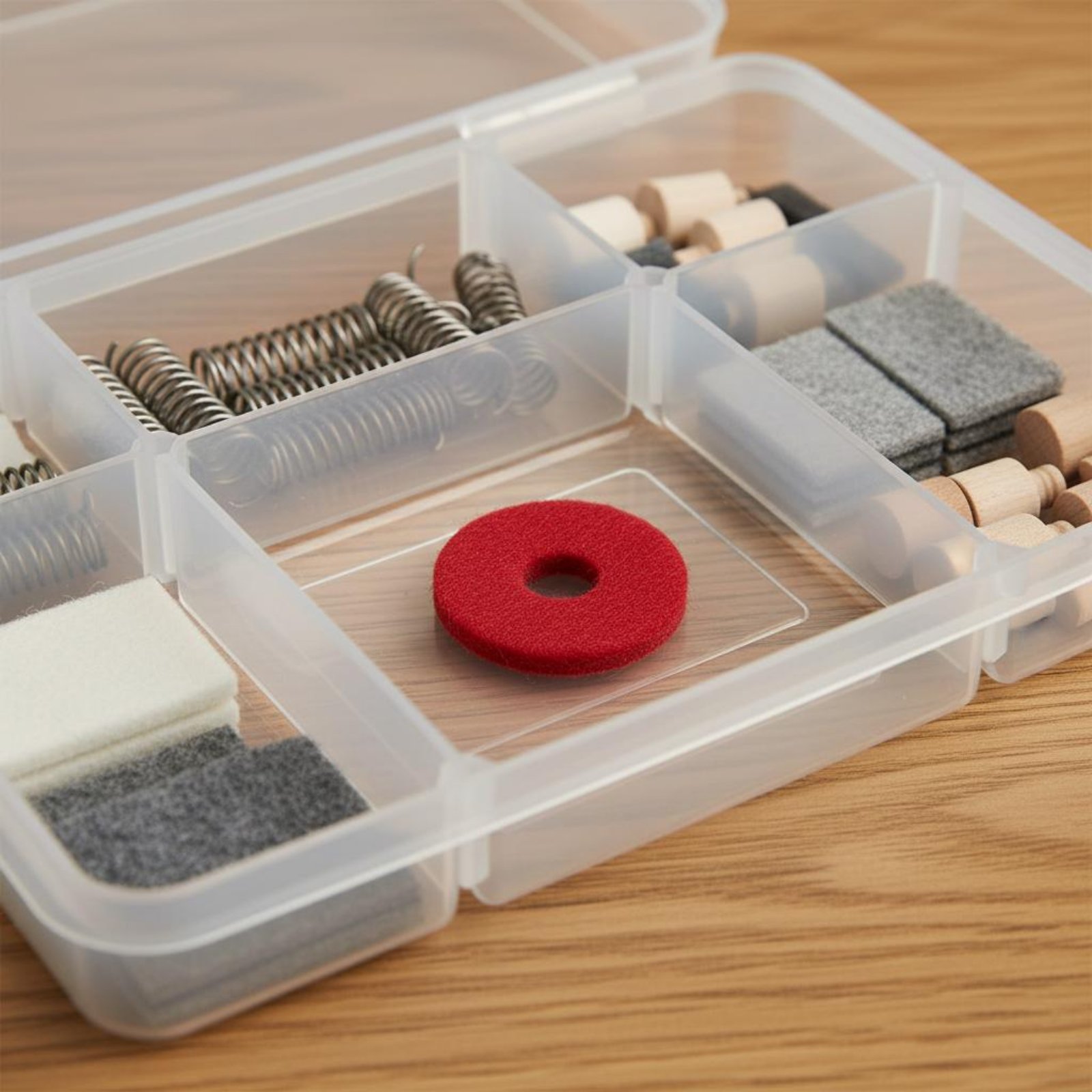 Rode pianotoetsring Kleine ron - A Musical Instrument With Keys recensie en prijs